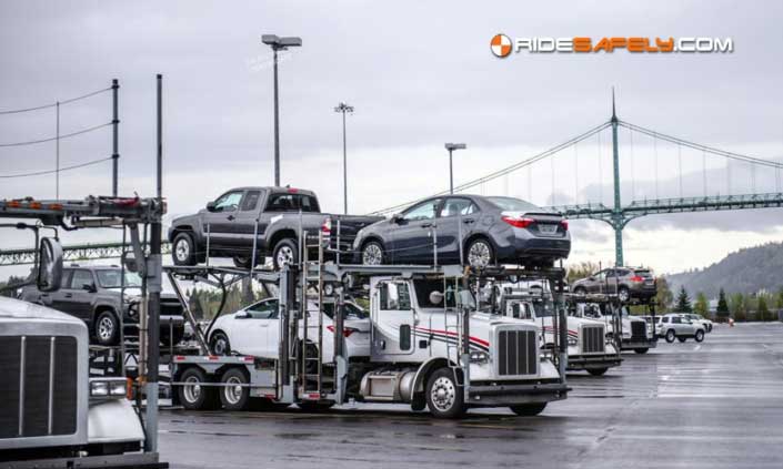 Semi trucks with loaded cars
