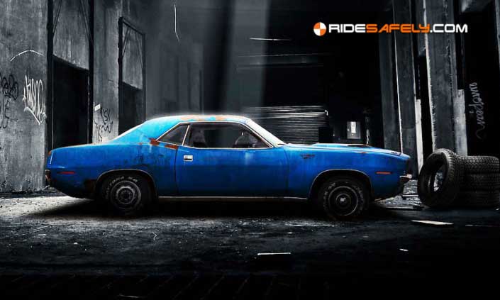 A blue muscle car abandoned