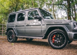Mercedes-Benz G-Class available at online car auctions, parked on a dirt road