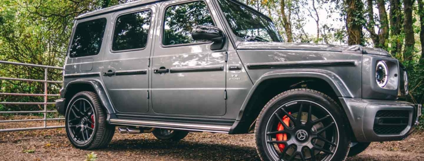 Mercedes-Benz G-Class available at online car auctions, parked on a dirt road