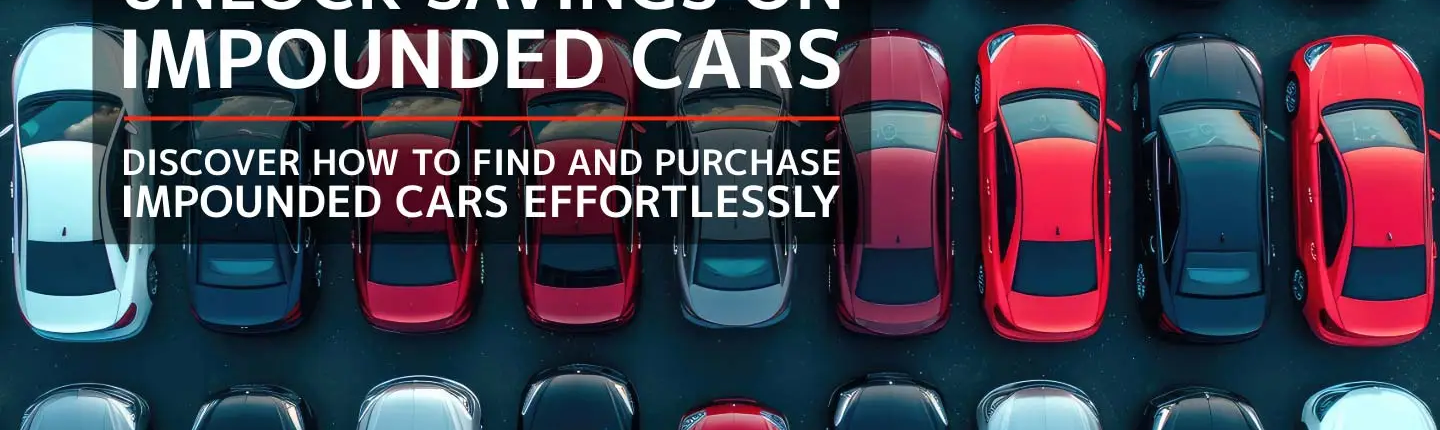 Overhead view of various impounded cars neatly arranged in rows within an auction lot