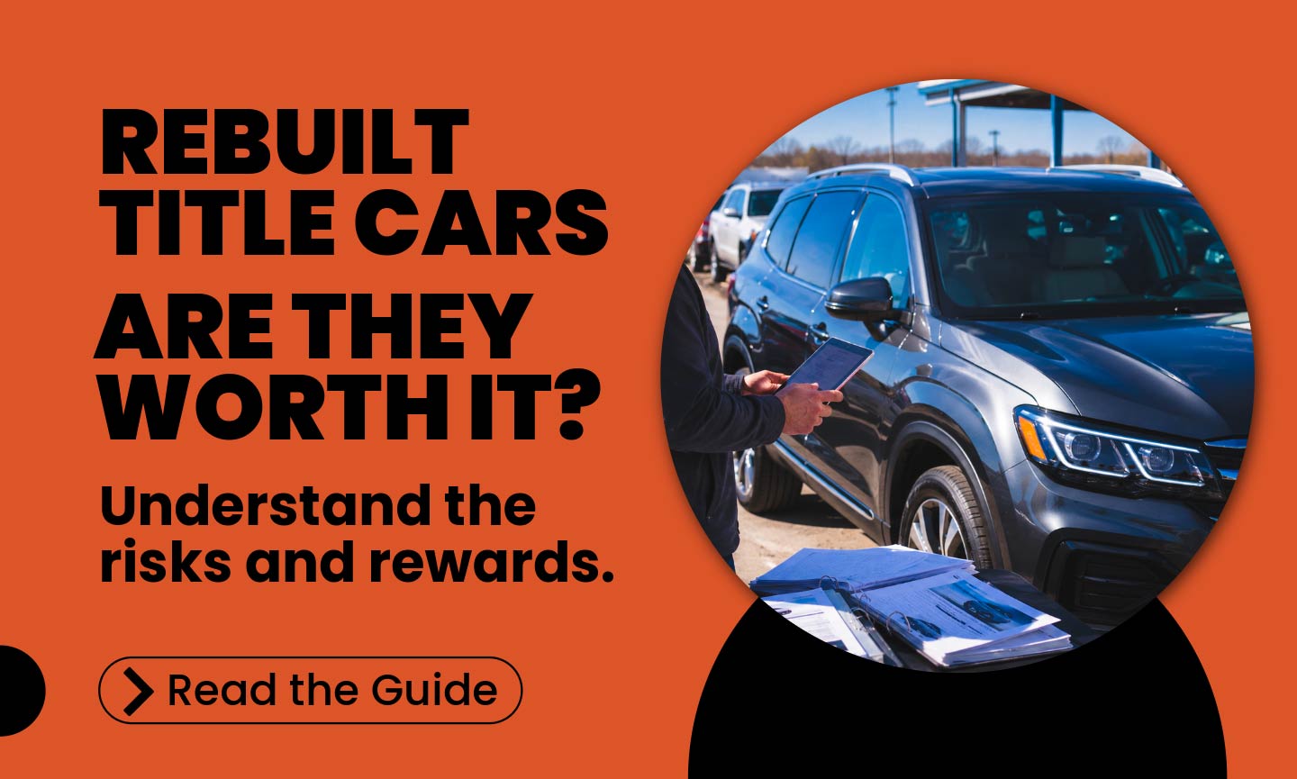 Buyer reviewing vehicle history reports while comparing rebuilt title and clean-title vehicles